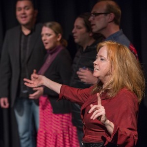 O-Lan Jones (foreground, right) directs members of the Spontaneous Combustion Choir (photo credit: Martha Benedict)